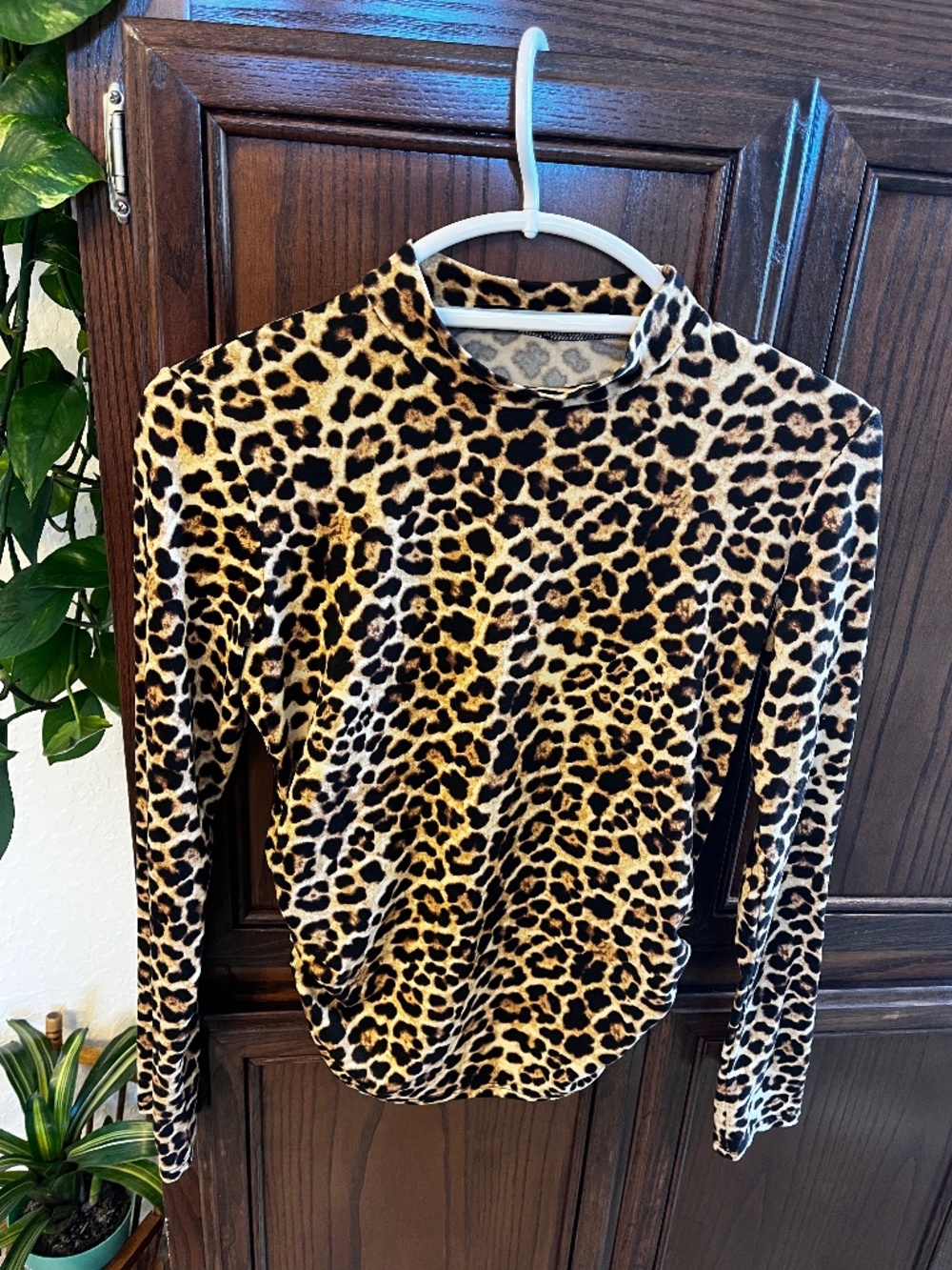 Women’s cheetah print under shirt.